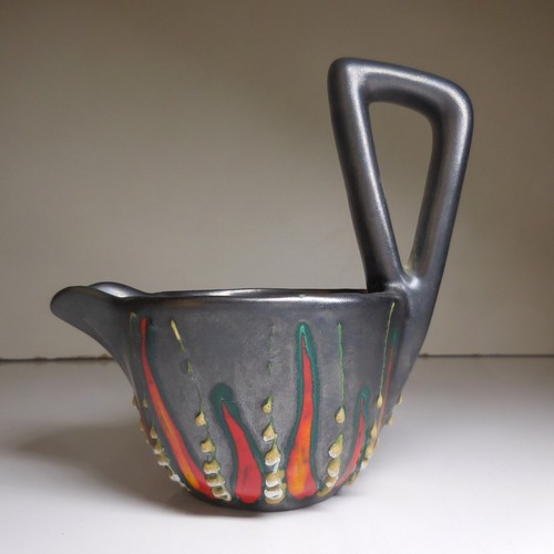 Saucière verseuse vide-poche